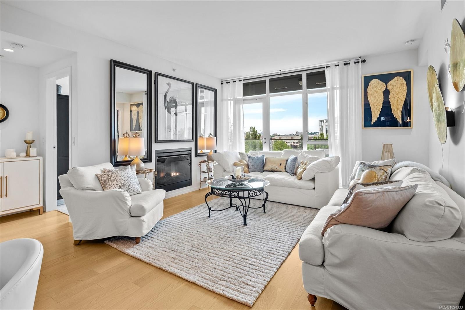 208-100 Saghalie Rd, Victoria, BC - Indoor Photo Showing Living Room With Fireplace
