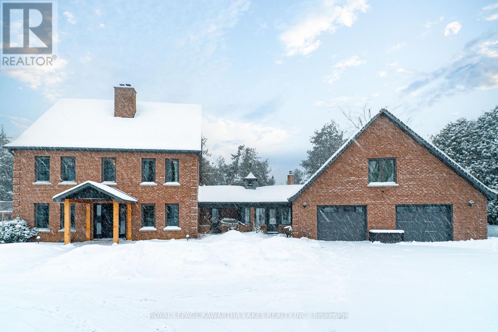 61 Kenrei Road, Kawartha Lakes (Lindsay), ON - Outdoor With Facade
