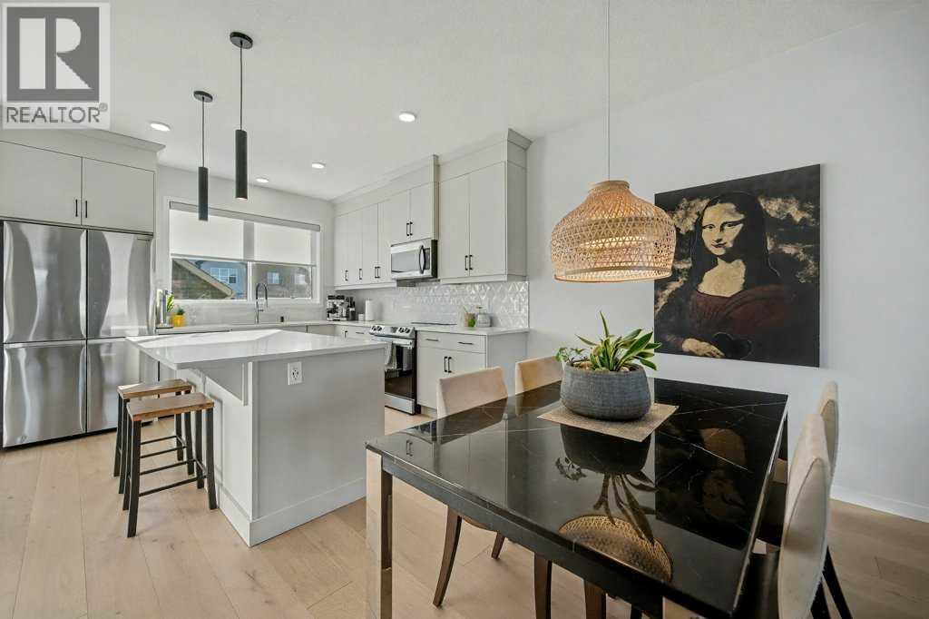 551 Wolf Creek Way Se, Calgary, AB - Indoor Photo Showing Kitchen With Upgraded Kitchen