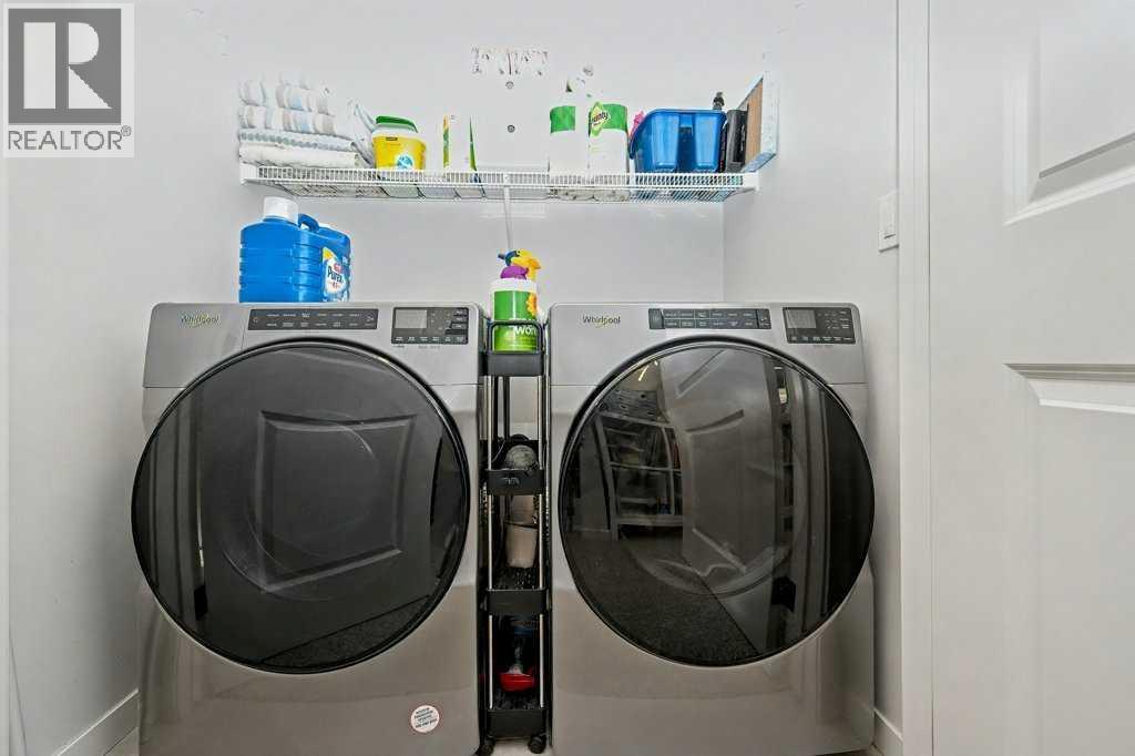 551 Wolf Creek Way Se, Calgary, AB - Indoor Photo Showing Laundry Room