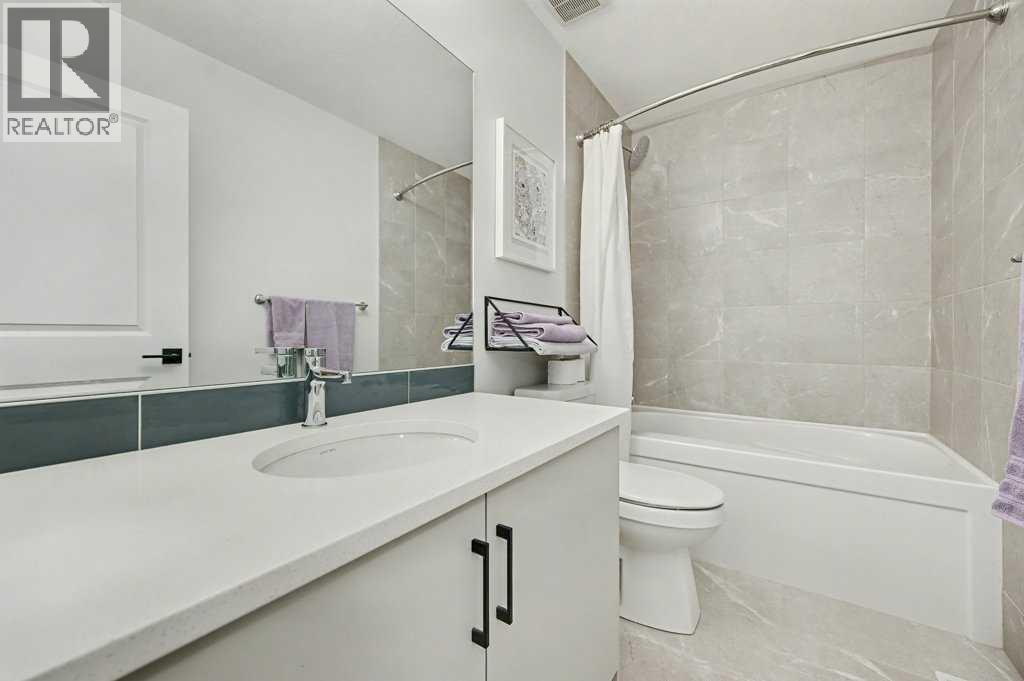 551 Wolf Creek Way Se, Calgary, AB - Indoor Photo Showing Bathroom