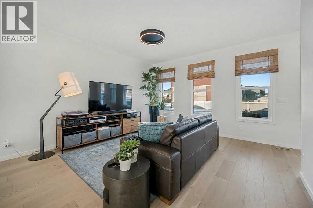 551 Wolf Creek Way Se, Calgary, AB - Indoor Photo Showing Living Room