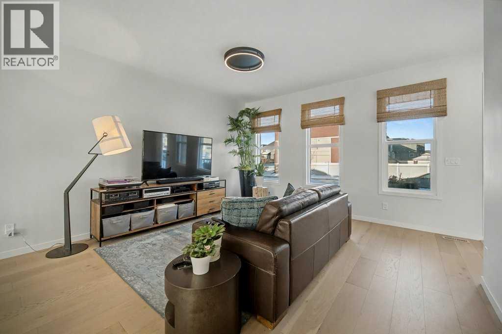 551 Wolf Creek Way Se, Calgary, AB - Indoor Photo Showing Living Room