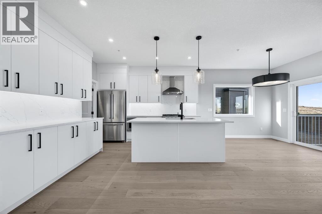 150 Prince Crescent, Rural Rocky View County, AB - Indoor Photo Showing Kitchen With Stainless Steel Kitchen With Upgraded Kitchen