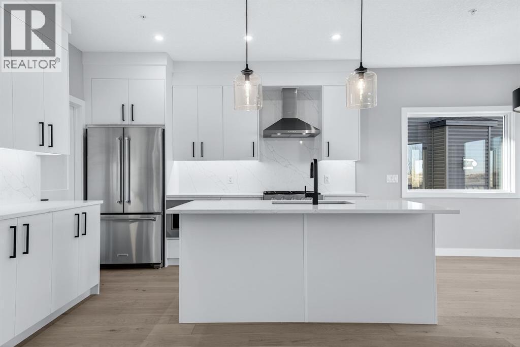 150 Prince Crescent, Rural Rocky View County, AB - Indoor Photo Showing Kitchen With Stainless Steel Kitchen With Upgraded Kitchen