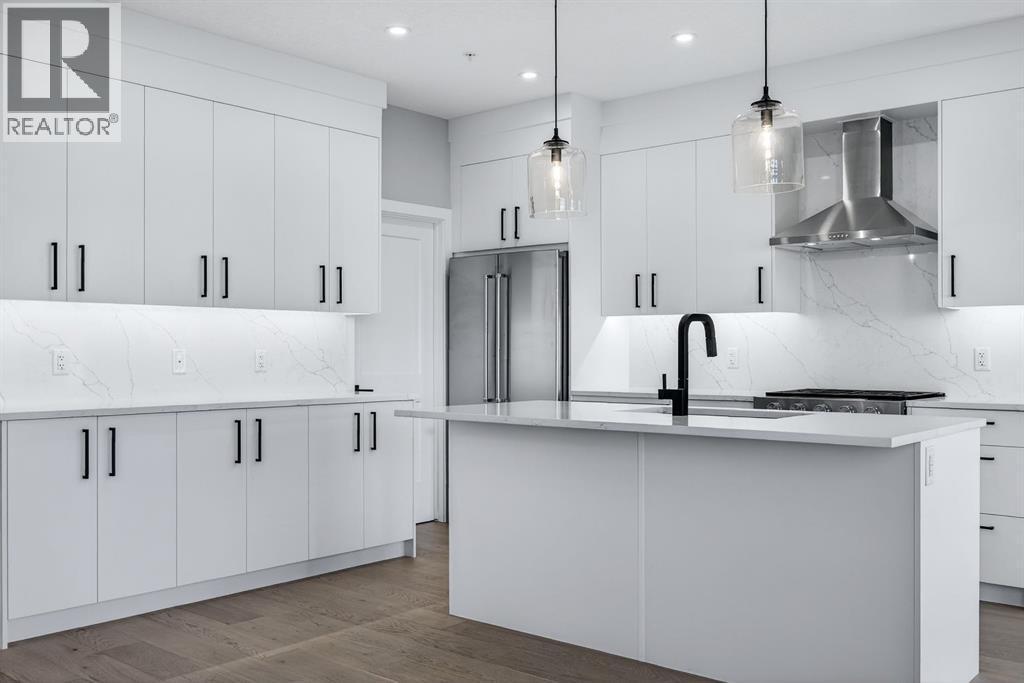 150 Prince Crescent, Rural Rocky View County, AB - Indoor Photo Showing Kitchen With Upgraded Kitchen