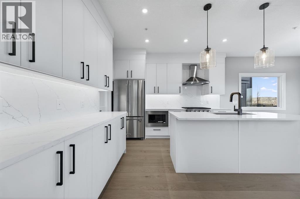 150 Prince Crescent, Rural Rocky View County, AB - Indoor Photo Showing Kitchen With Stainless Steel Kitchen With Upgraded Kitchen