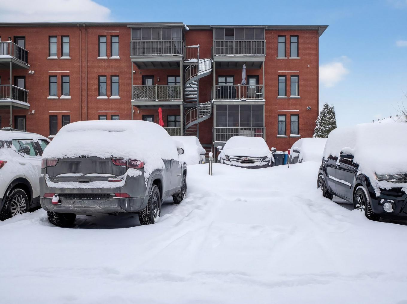 Parking - 402-2293 Rue Racine, Longueuil (Saint-Hubert), QC - Outdoor With Facade