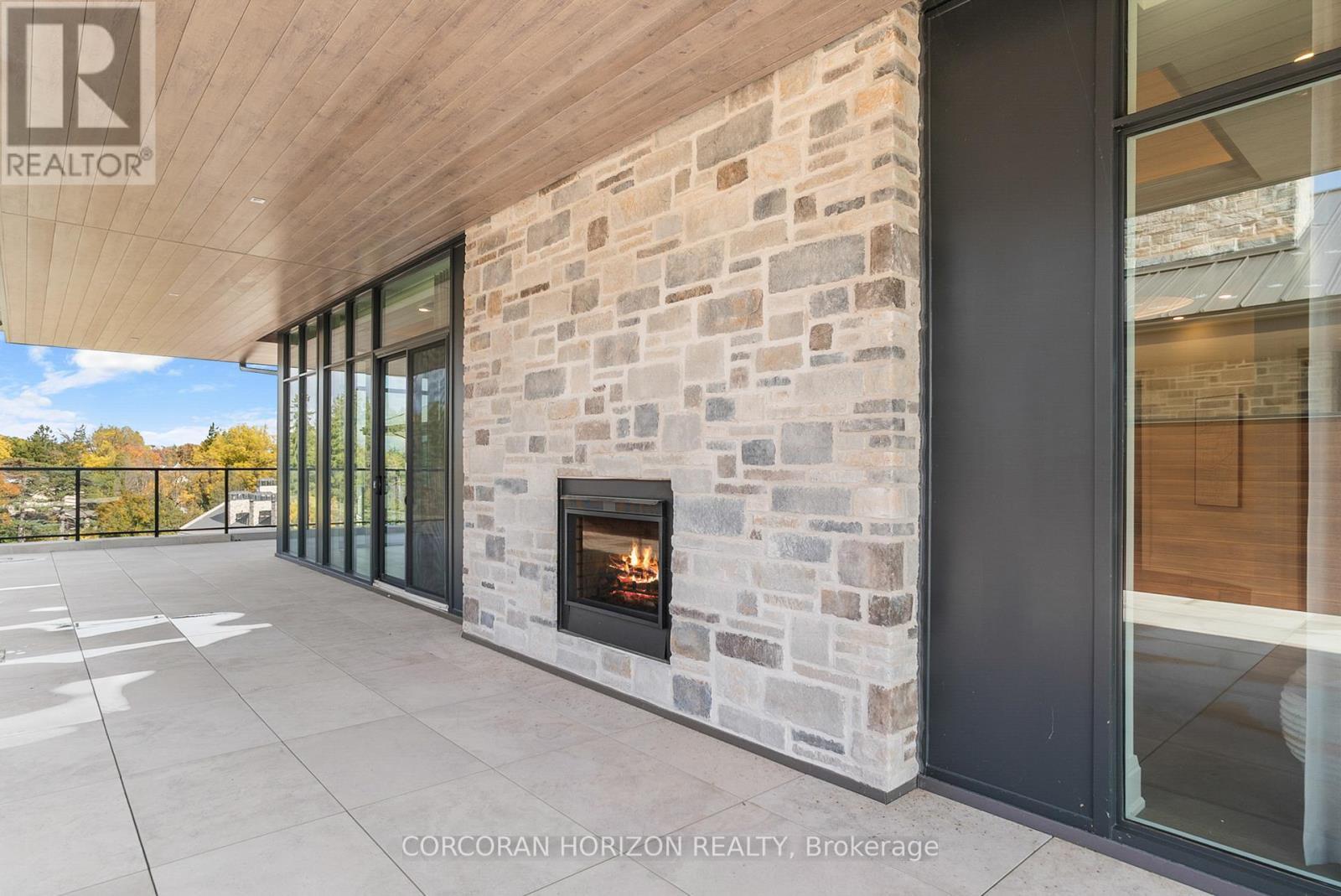 506 - 6523 Wellington 7 Road, Centre Wellington, ON - Outdoor With Fireplace With Exterior
