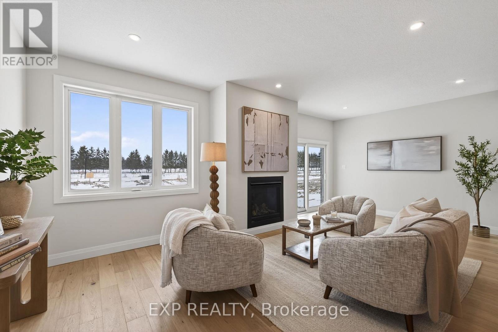 96 Dearing Street, South Huron (Stephen), ON - Indoor Photo Showing Living Room With Fireplace