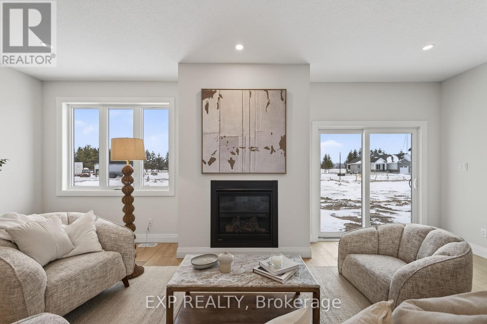 96 Dearing Street, South Huron (Stephen), ON - Indoor Photo Showing Living Room With Fireplace
