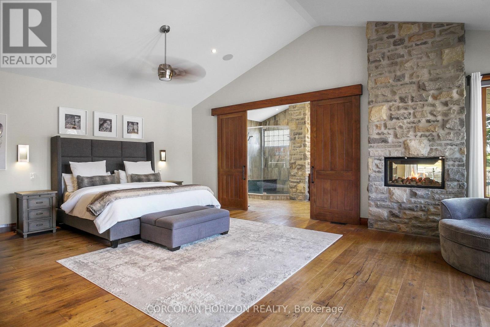 1546 Maryhill Road, Woolwich, ON - Indoor Photo Showing Bedroom With Fireplace