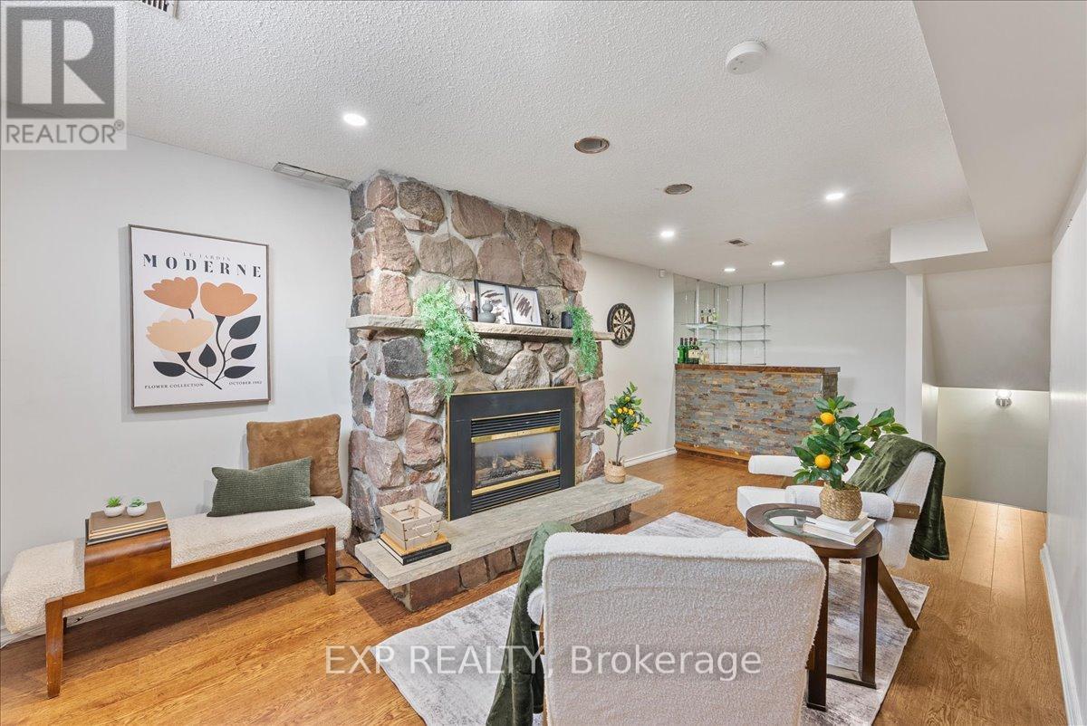 1165 Whitefield Drive, Peterborough (Otonabee Ward 1), ON - Indoor Photo Showing Living Room With Fireplace