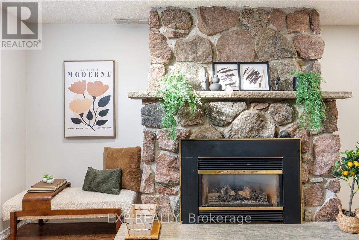1165 Whitefield Drive, Peterborough (Otonabee Ward 1), ON - Indoor Photo Showing Living Room With Fireplace