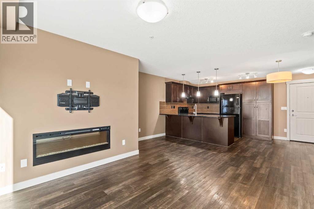 2209, 450 Sage Valley Drive Nw, Calgary, AB - Indoor With Fireplace