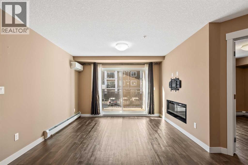 2209, 450 Sage Valley Drive Nw, Calgary, AB - Indoor With Fireplace