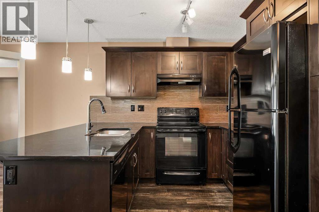 2209, 450 Sage Valley Drive Nw, Calgary, AB - Indoor Photo Showing Kitchen