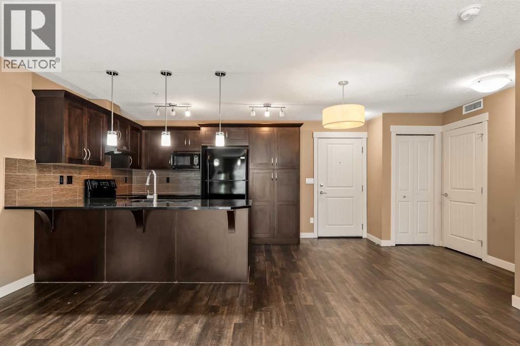 2209, 450 Sage Valley Drive Nw, Calgary, AB - Indoor Photo Showing Kitchen With Upgraded Kitchen