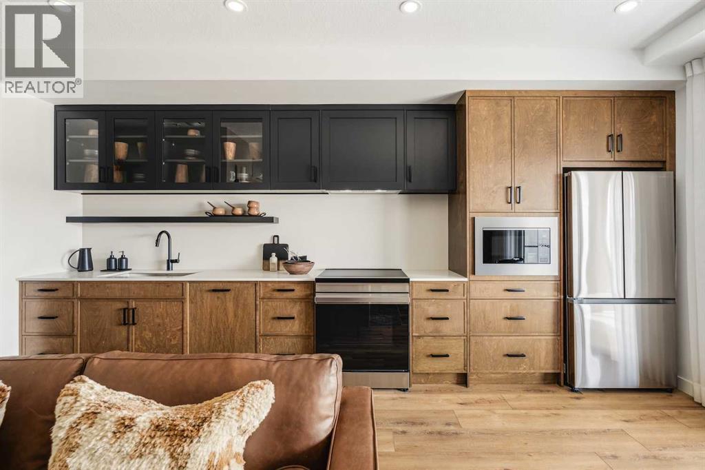 3211, 1802 Mahogany Boulevard Se, Calgary, AB - Indoor Photo Showing Kitchen With Stainless Steel Kitchen
