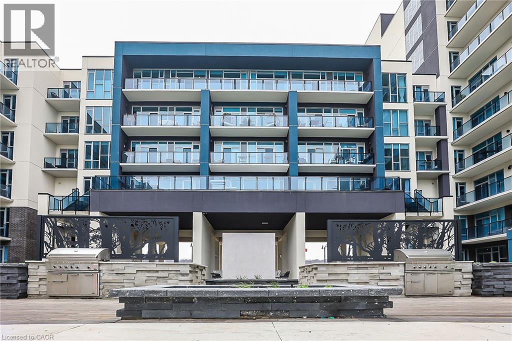 View of apartment building / complex - 16 Concord Place Unit# 431, Grimsby, ON - Outdoor With Balcony With Facade