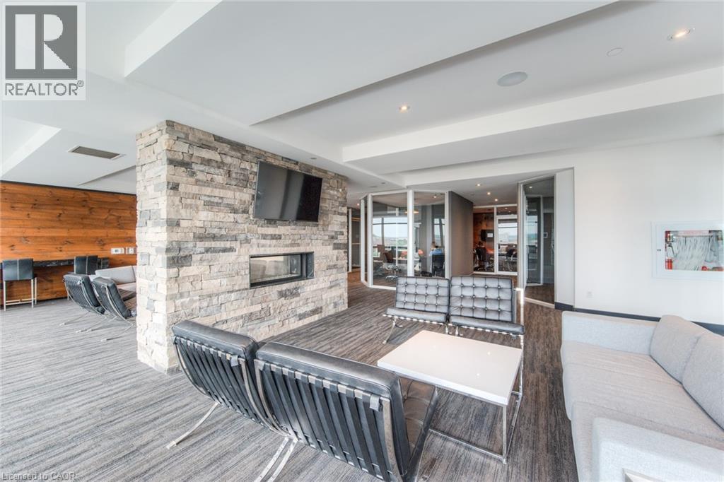 330 Phillip Street Unit# S2007, Waterloo, ON - Indoor Photo Showing Living Room With Fireplace