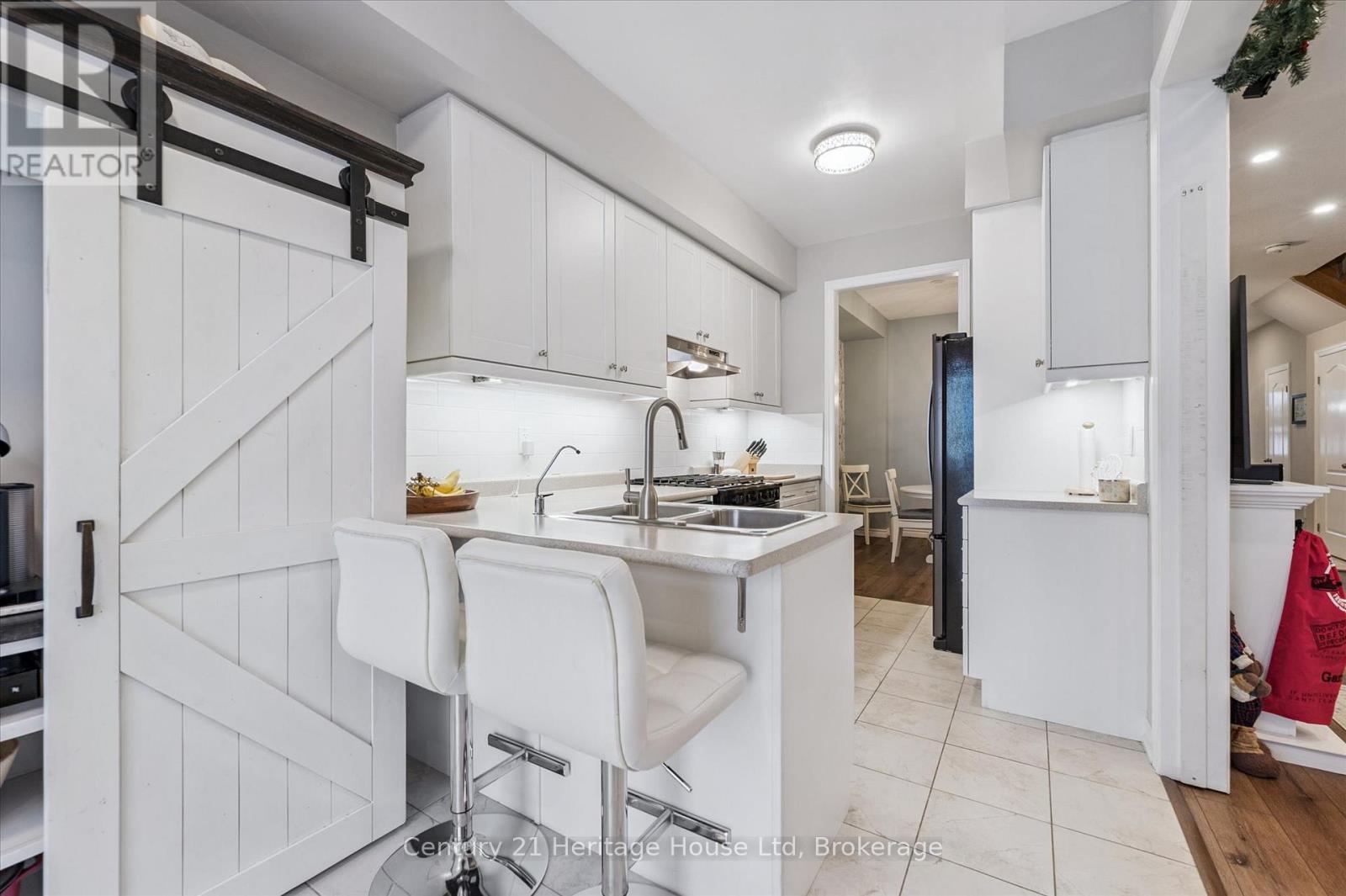 73 Courtney Street, Centre Wellington (Fergus), ON - Indoor Photo Showing Kitchen With Double Sink