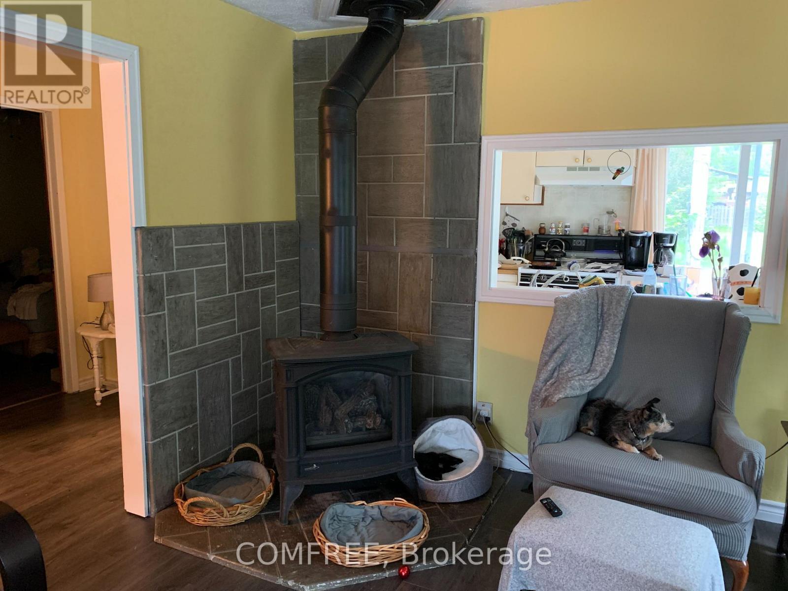 39 Lake Street, South Algonquin, ON - Indoor With Fireplace