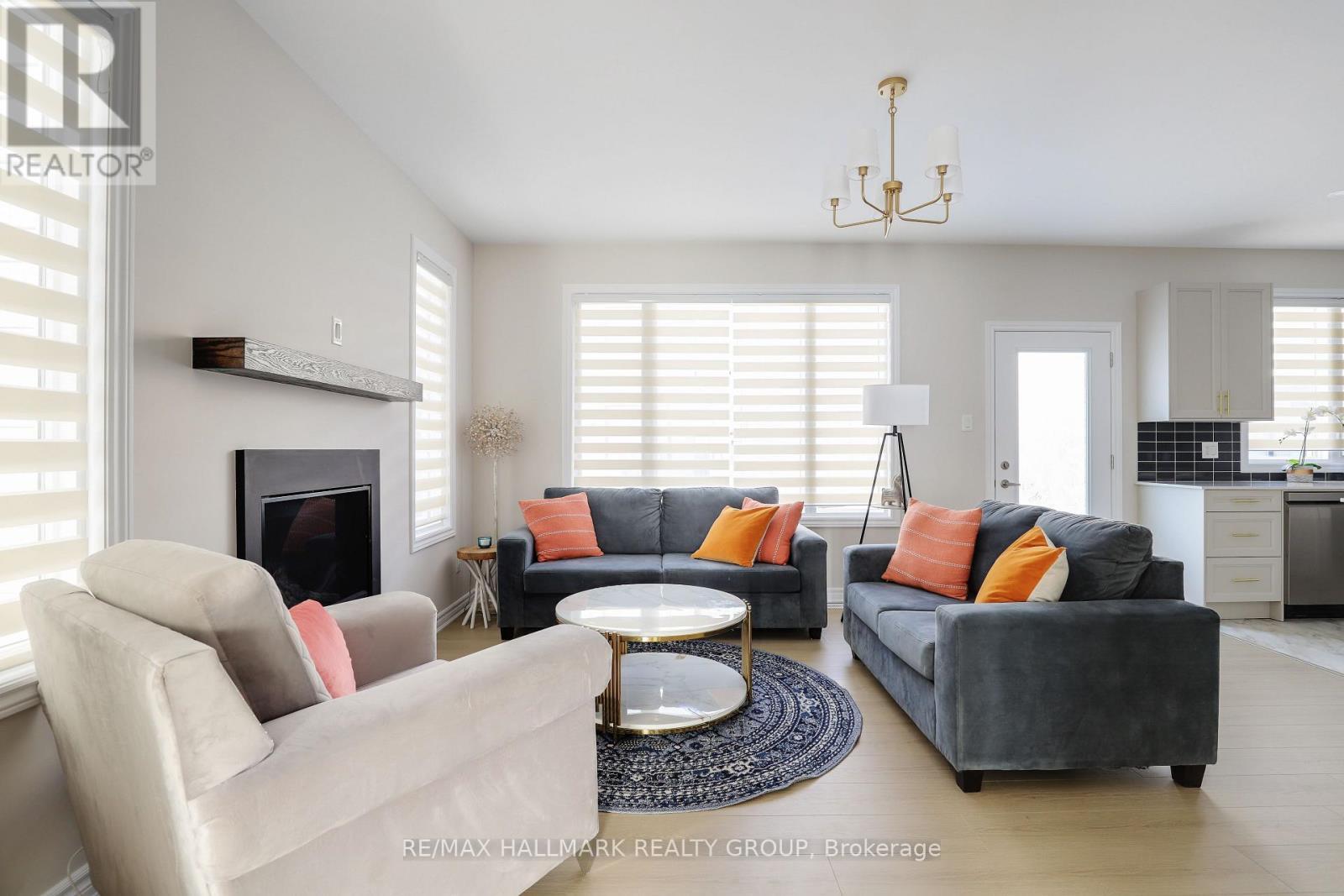 258 Sapling Grove, Ottawa, ON - Indoor Photo Showing Living Room With Fireplace