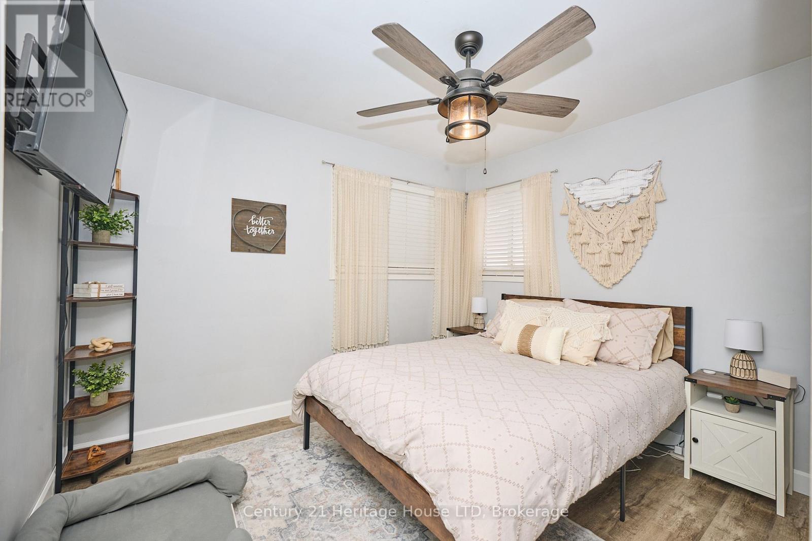 another angle of the mainfloor master - 8845 Banting Avenue, Niagara Falls (Chippawa), ON - Indoor Photo Showing Bedroom