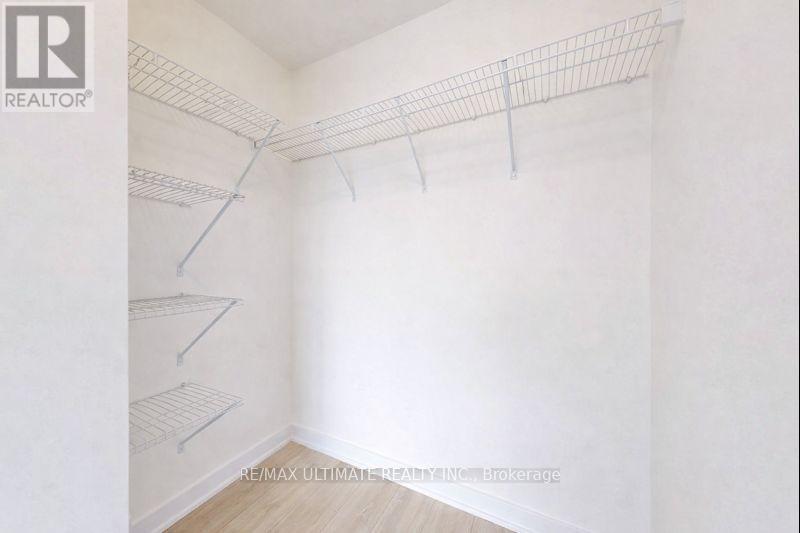 Primary Walk-In Closet - 2604 - 100 Dalhousie Street, Toronto, ON - Indoor With Storage