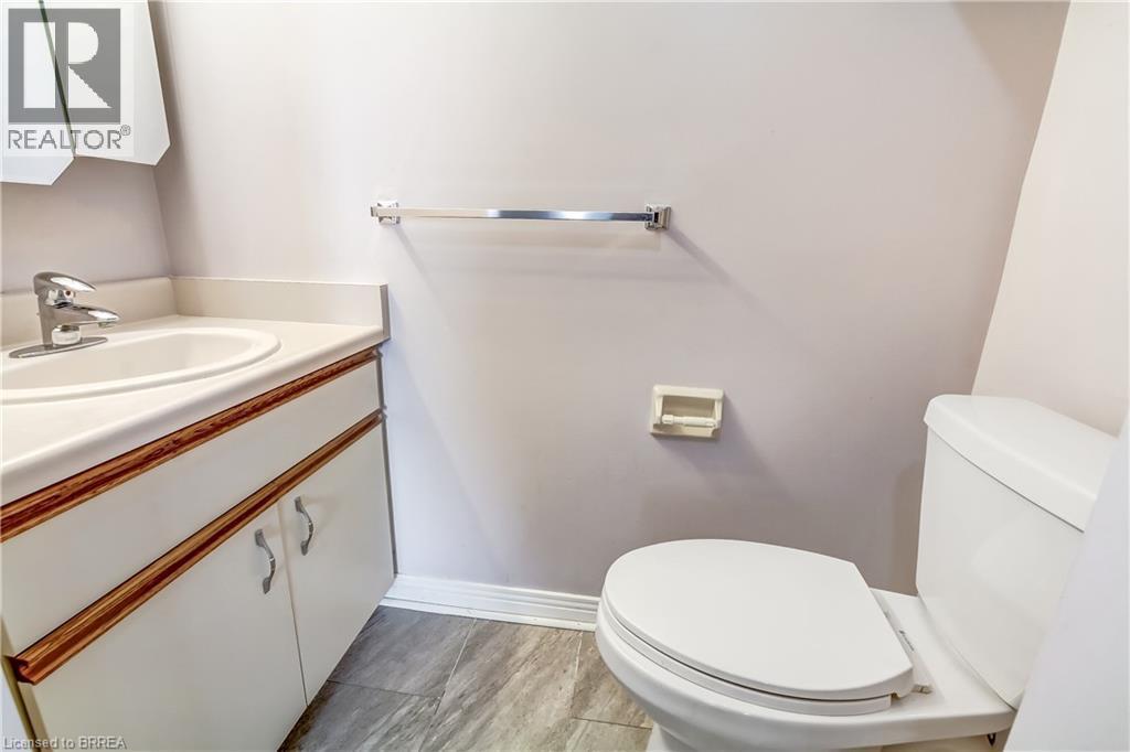 2-piece ensuite. - 88 Tollgate Road Unit# 402, Brantford, ON - Indoor Photo Showing Bathroom