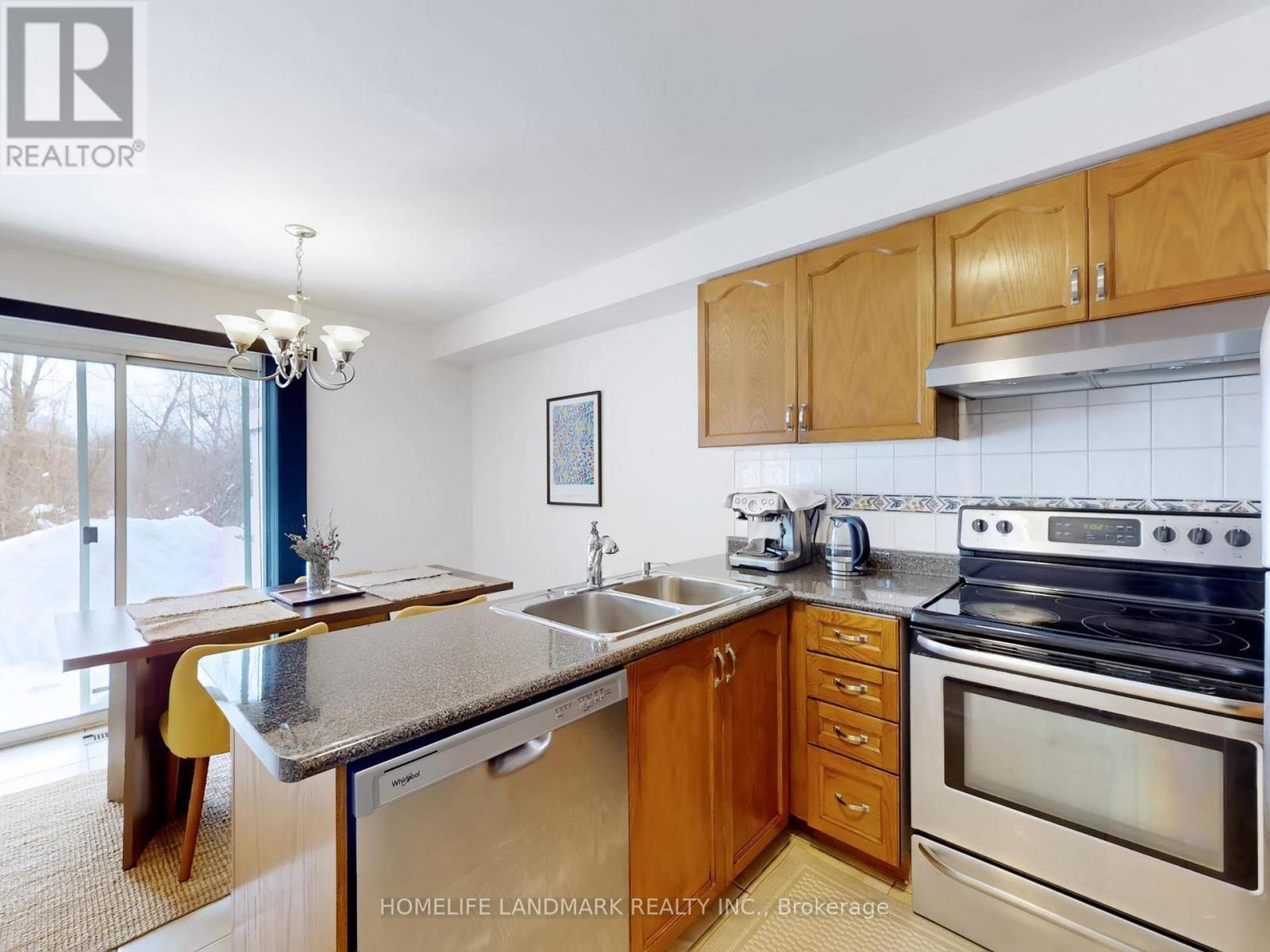 156 Pressed Brick Drive, Brampton, ON - Indoor Photo Showing Kitchen With Double Sink
