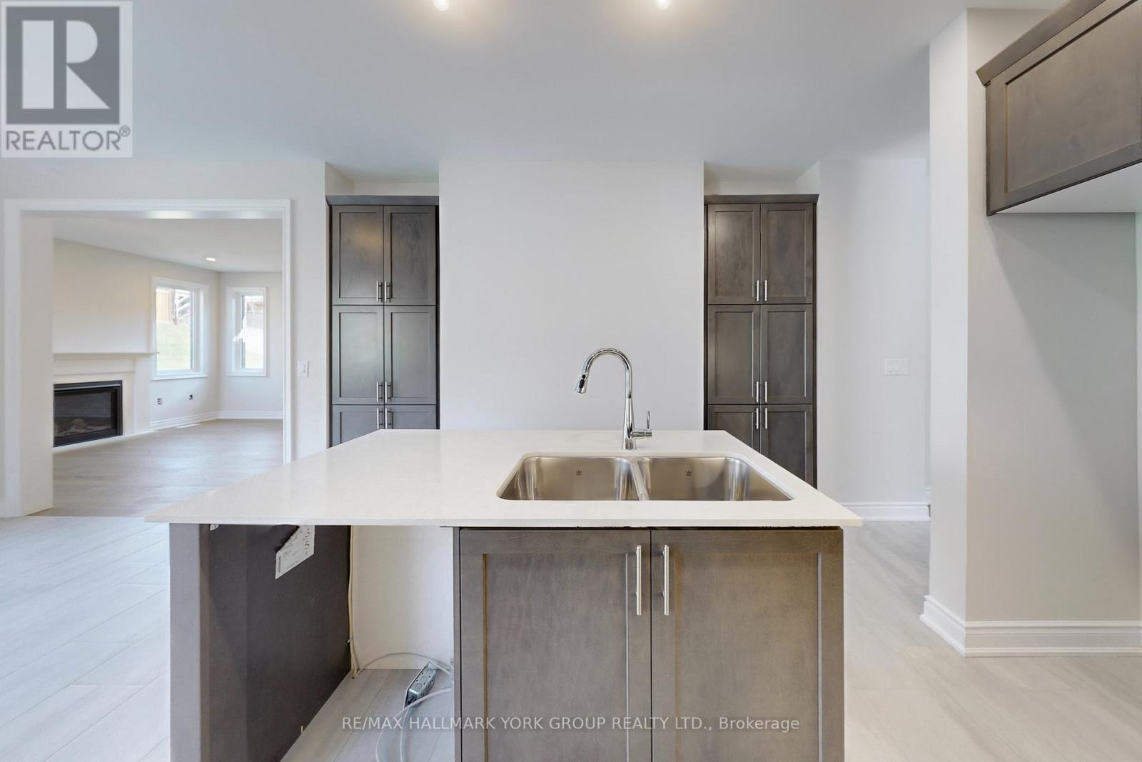 2966 Monarch Drive, Orillia, ON - Indoor Photo Showing Kitchen With Fireplace
