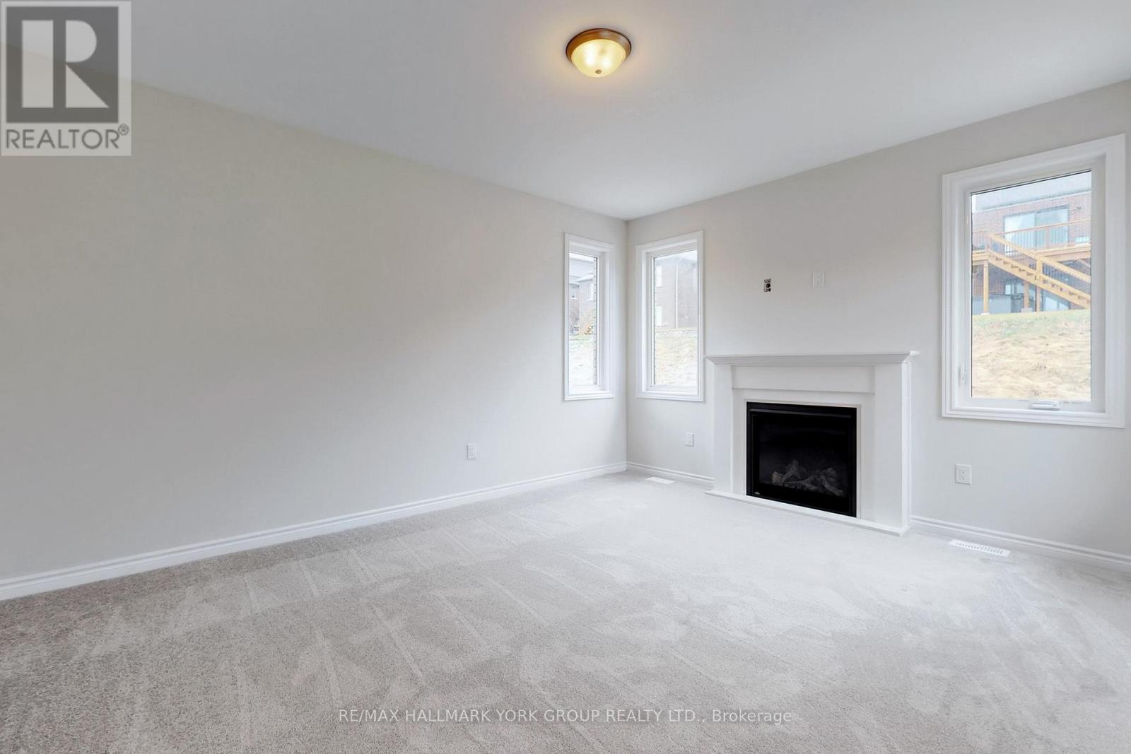 2964 Monarch Drive, Orillia, ON - Indoor Photo Showing Living Room With Fireplace