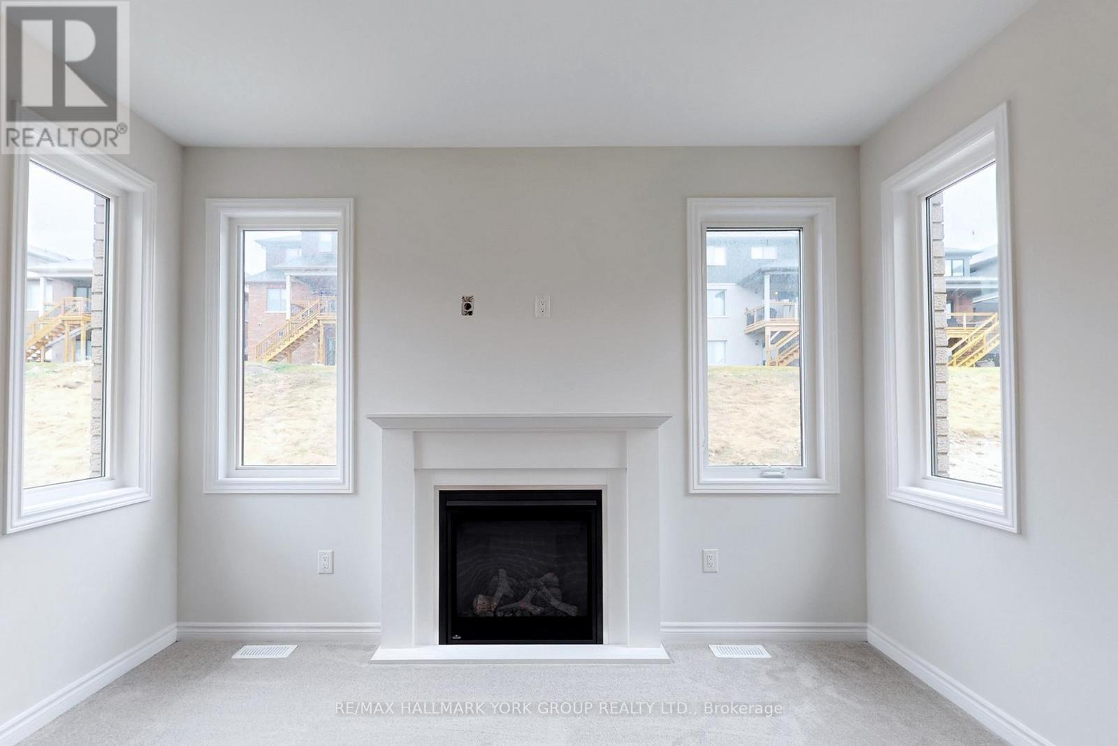 2964 Monarch Drive, Orillia, ON - Indoor Photo Showing Living Room With Fireplace