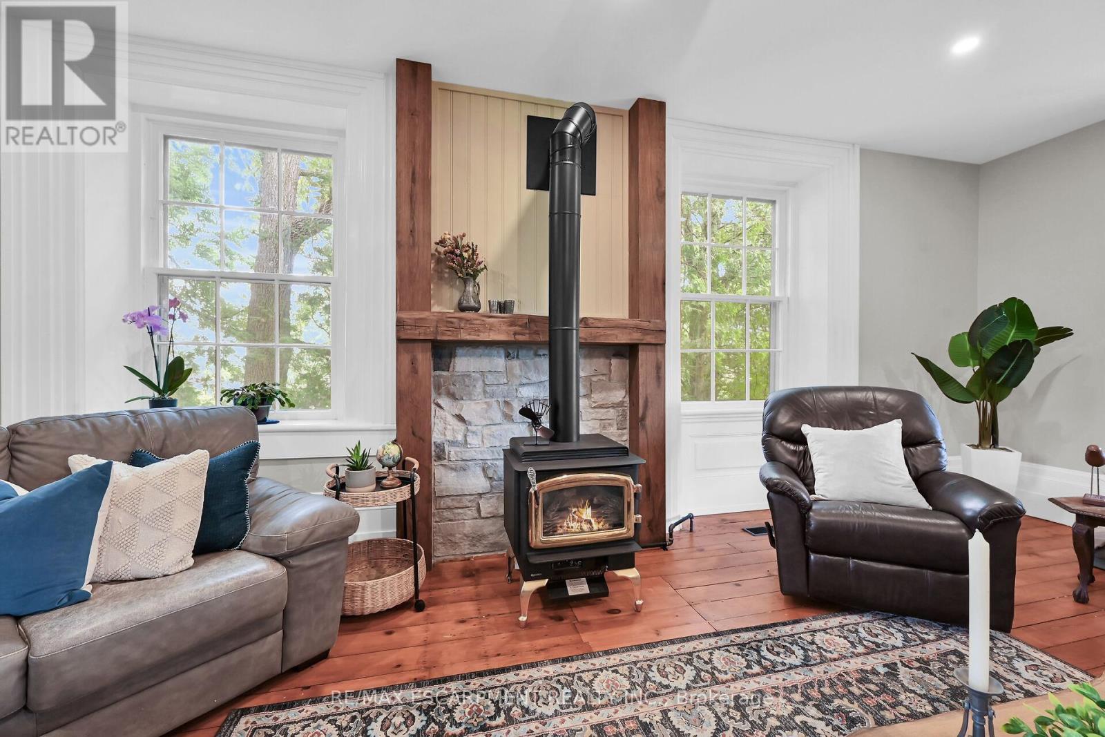 463 Concession 14 Road, Haldimand, ON - Indoor Photo Showing Living Room With Fireplace