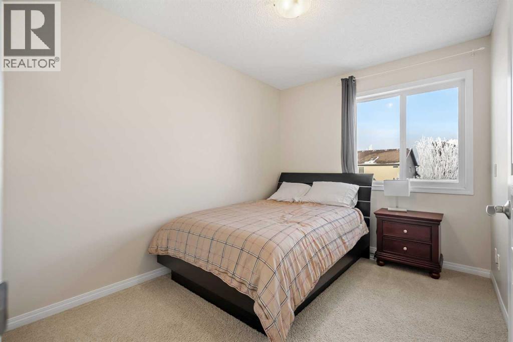 32 Auburn Bay Boulevard Se, Calgary, AB - Indoor Photo Showing Bedroom