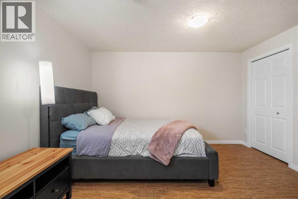 32 Auburn Bay Boulevard Se, Calgary, AB - Indoor Photo Showing Bedroom