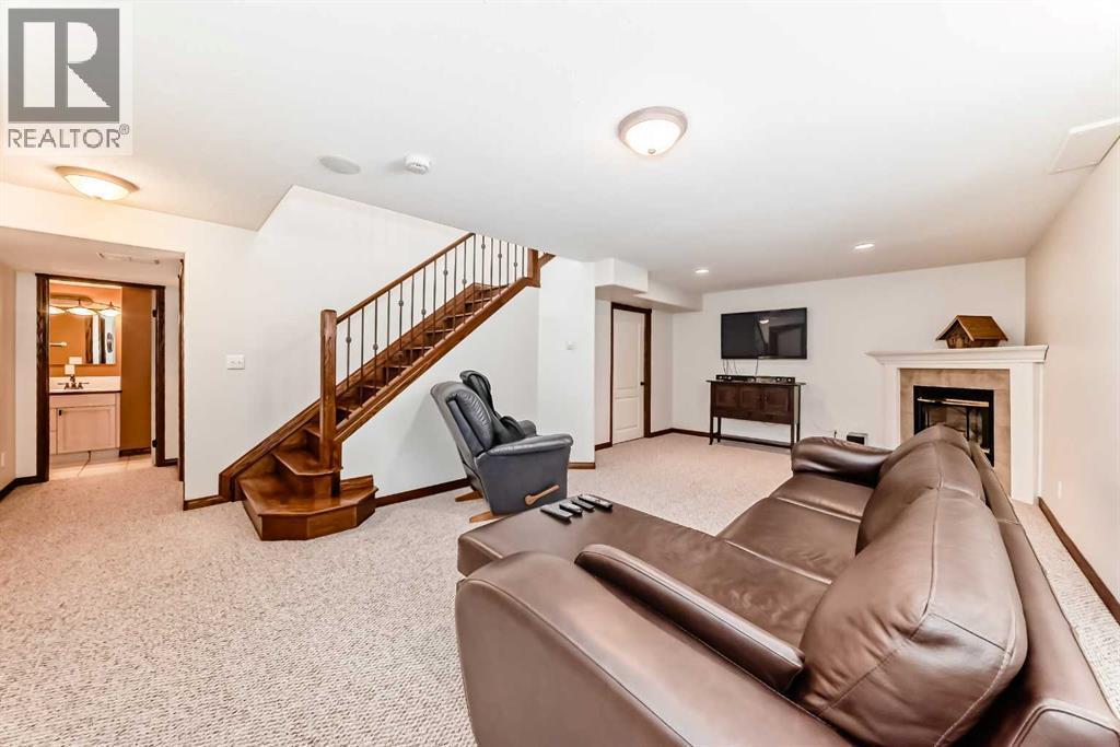 5647 55 Avenuecrescent, Innisfail, AB - Indoor With Fireplace