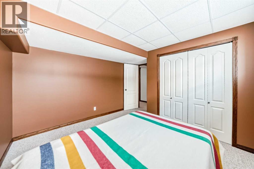 5647 55 Avenuecrescent, Innisfail, AB - Indoor Photo Showing Bedroom