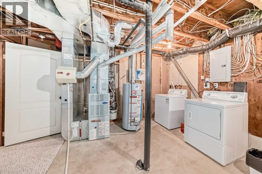 5647 55 Avenuecrescent, Innisfail, AB - Indoor Photo Showing Laundry Room