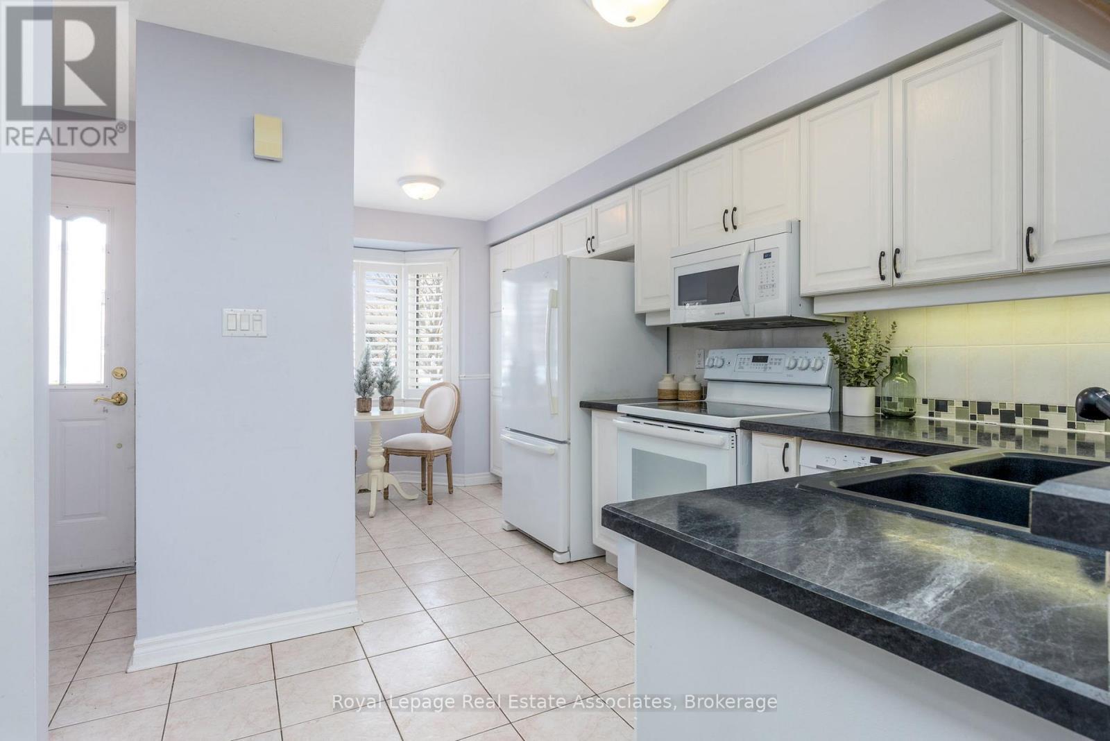 76 River Drive, Halton Hills, ON - Indoor Photo Showing Kitchen With Double Sink