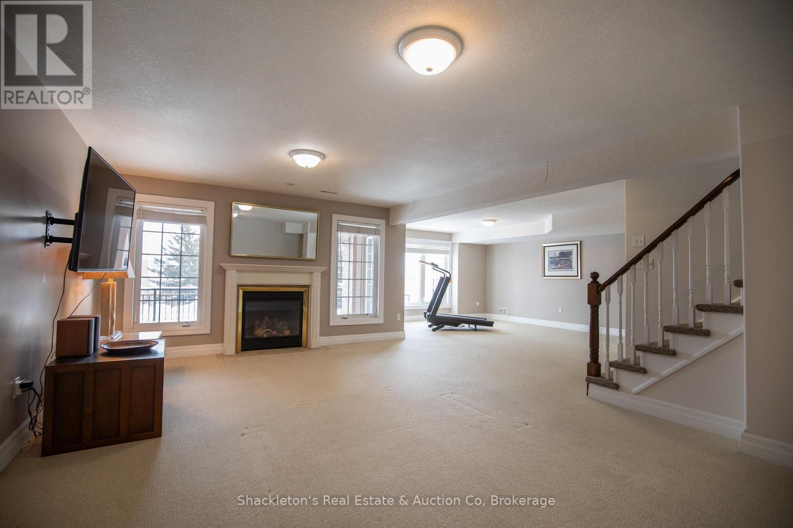 4 - 165 Chandos Drive, Kitchener, ON - Indoor With Fireplace