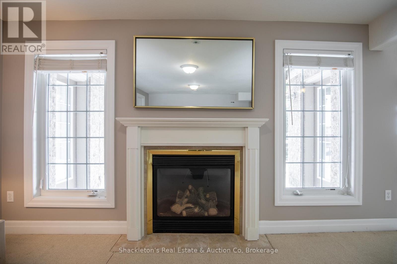 4 - 165 Chandos Drive, Kitchener, ON - Indoor Photo Showing Living Room With Fireplace