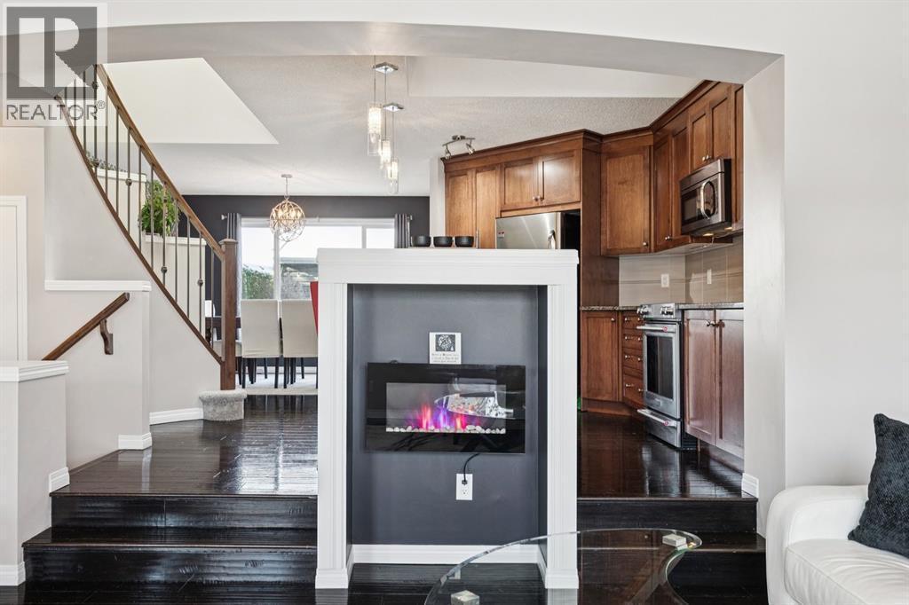 15 New Brighton Common Se, Calgary, AB - Indoor With Fireplace