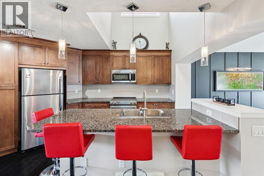 15 New Brighton Common Se, Calgary, AB - Indoor Photo Showing Kitchen With Upgraded Kitchen