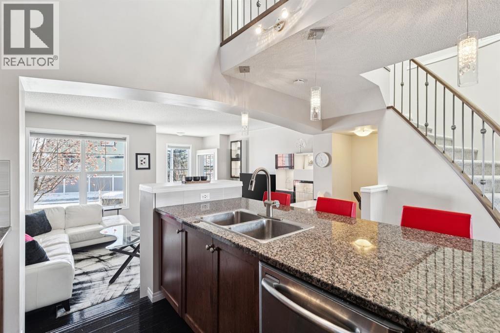 15 New Brighton Common Se, Calgary, AB - Indoor Photo Showing Kitchen With Double Sink