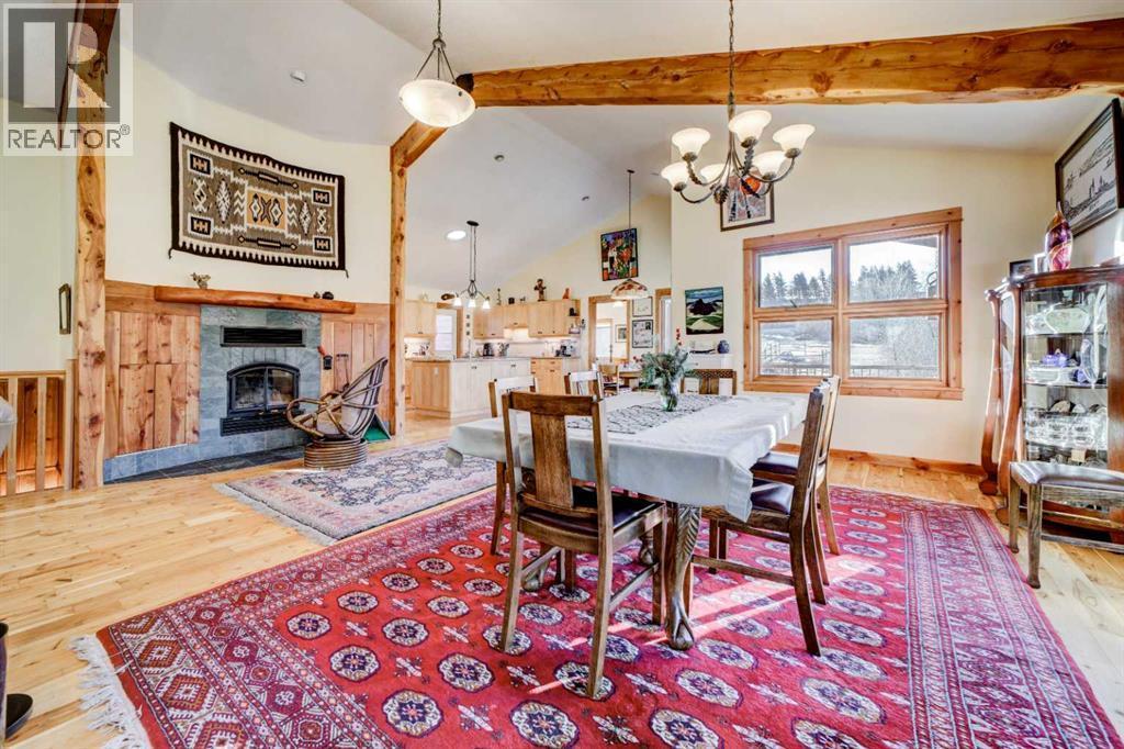 31 Villa Vega Acres, Rural Pincher Creek No. 9, M.D. Of, AB - Indoor Photo Showing Dining Room With Fireplace