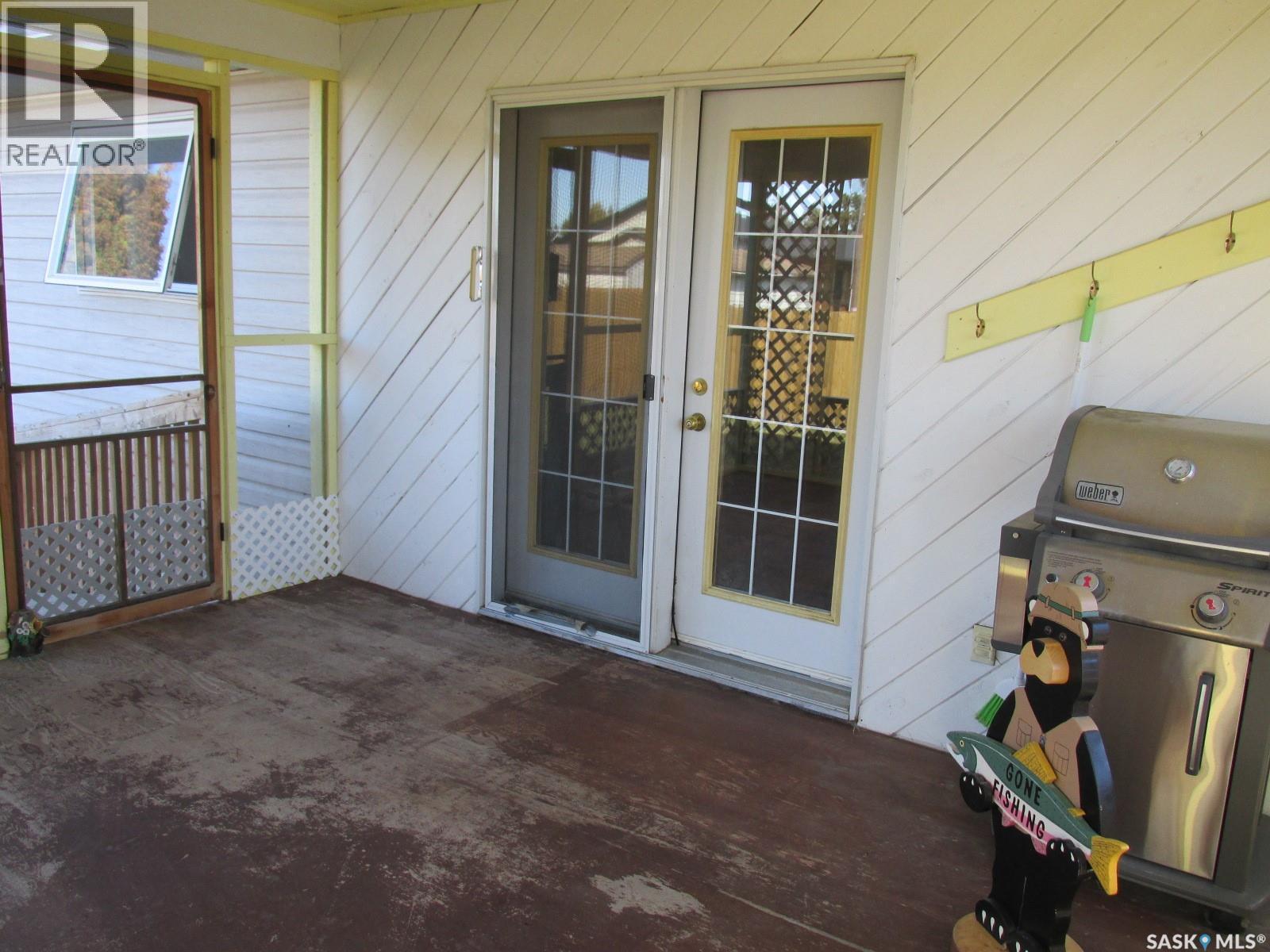 613 9Th Avenue W, Nipawin, SK - Outdoor With Deck Patio Veranda With Exterior