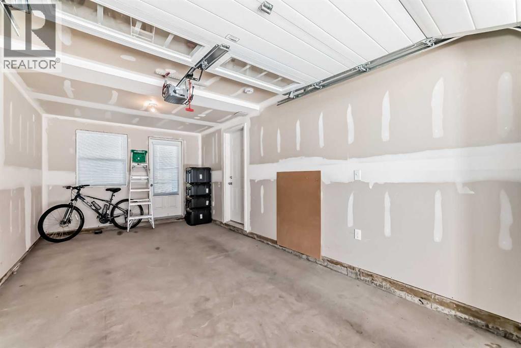 236 New Brighton Row Se, Calgary, AB - Indoor Photo Showing Garage